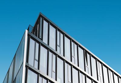 Corner of an office building against the sky